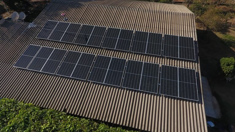 Solar panels installed on a rooftop serving an agricultural facility